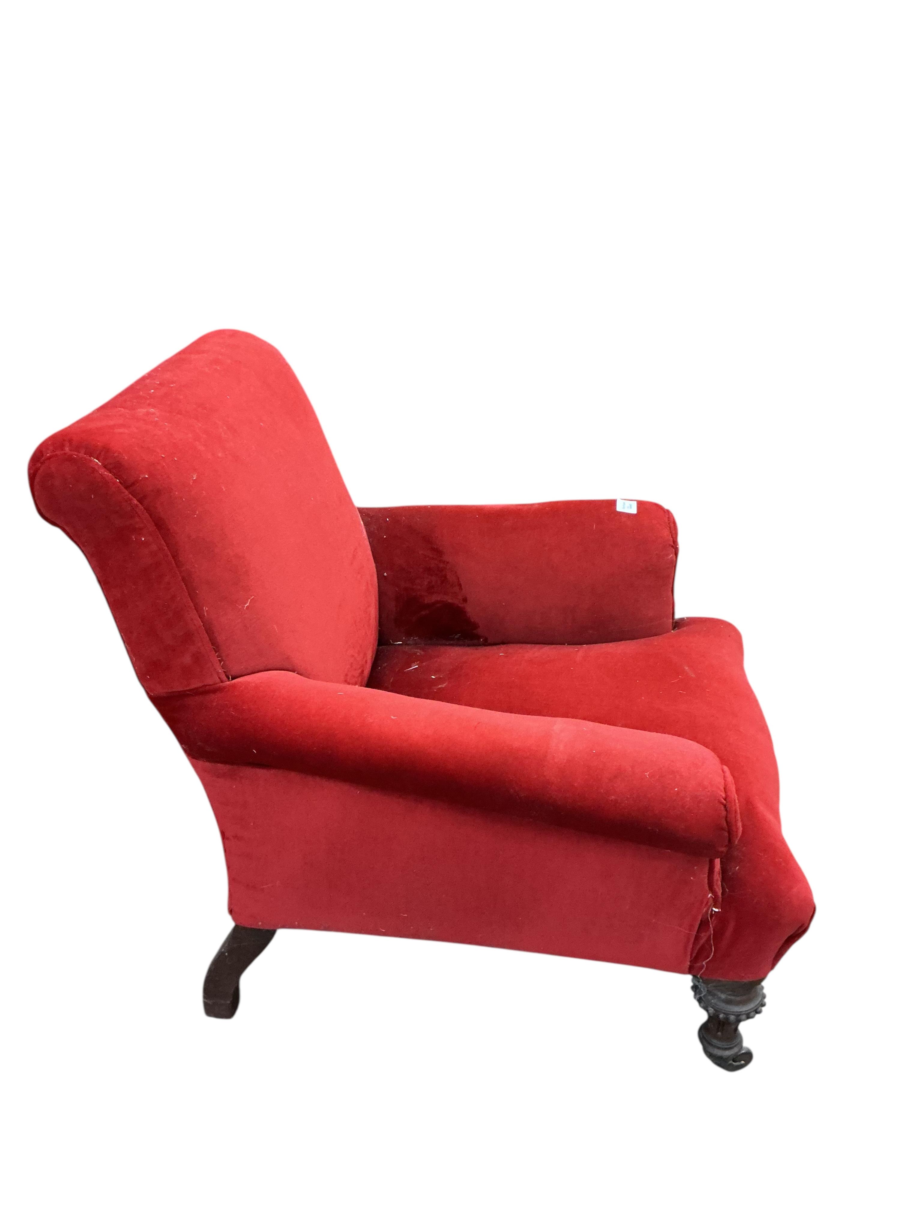 A Victorian upholstered armchair, width 84cm, depth 86cm, height 81cm